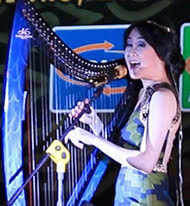 Angela July performing with Willy Music Entertainment